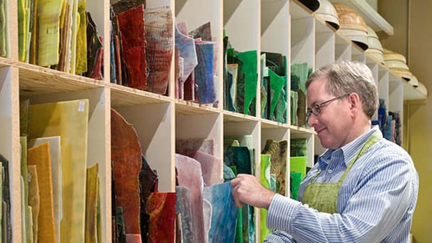 Bill Campbell of Century Studios keeps a stock of fine American-made, hand-rolled opalescent glass, the same glass Tiffany used. Photo by William Wright.