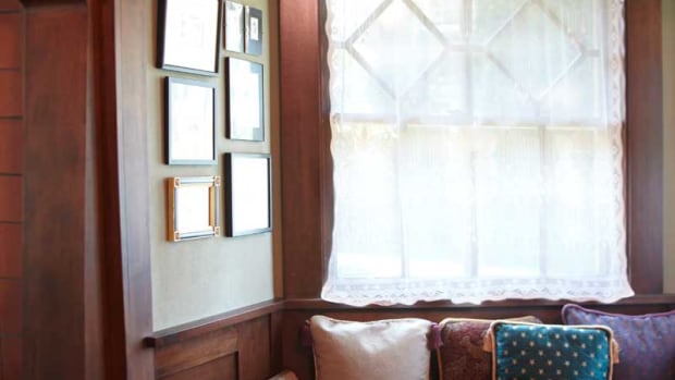 Original millwork in a 1908 Prairie-style house includes this window seat in a bay. Photo: Scott Van Dyke