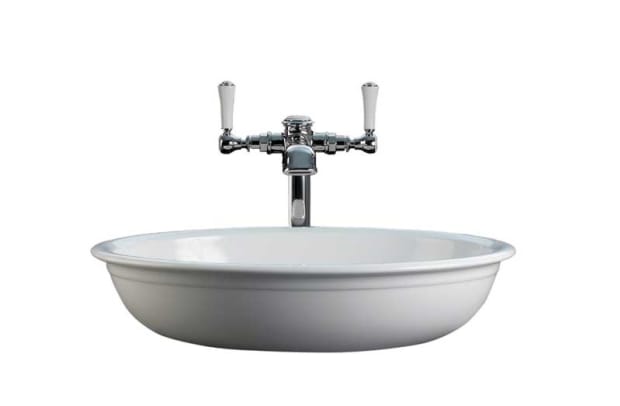 The Victoria + Albert vessel sink made from limestone-rich Englishcast is so very British.