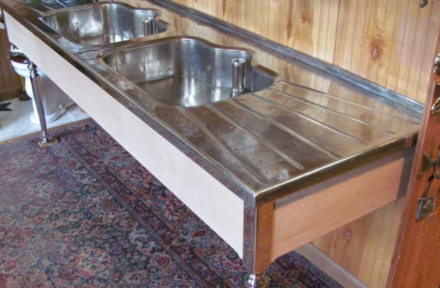 This 1912 German silver sink with original drainboards and legs was recently available from Bathroom Machineries for $14,500.