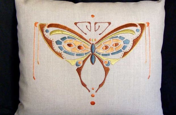 Hand-embroidered pillow by Roycroft Renaissance artisan Natalie Richards, Paint By Threads.