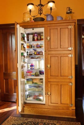 Ultimate in period style: a German Liebherr refrigerator built into custom cabinetry that looks just like an icebox. Photo by Philip Clayton-Thompson.