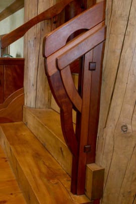 Designed by the architect of a recent Colorado project, a mahogany stair railing shows Dale’s versatility.