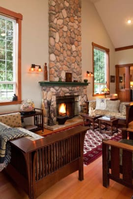 The living room features Stickley reproduction furniture and a few antiques.