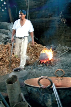 A Purepecha craftsman at the fire