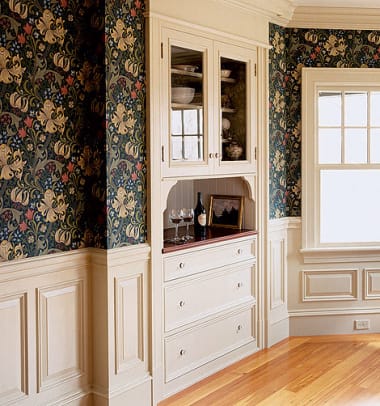 Poplar was used for the raised-panel wainscot and built-in buffet in a Massachusetts house. Photo by Eric Roth