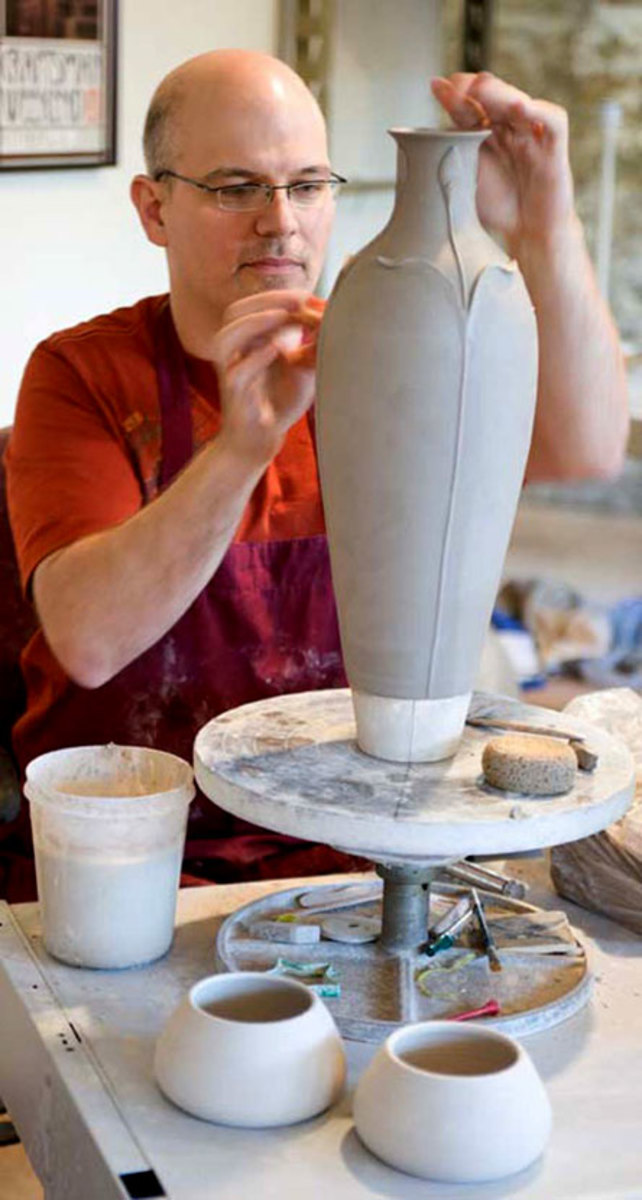 Founder and president Kevin Hicks in the studio, working on a ‘Revival’ vase.