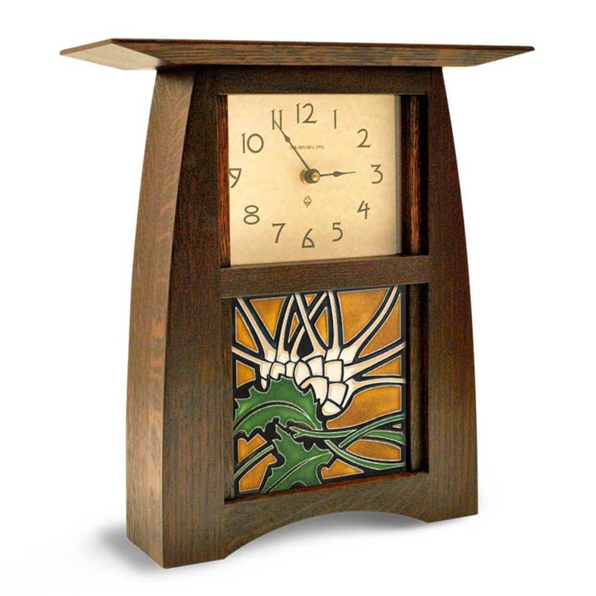 Stylized thistle tile from Motawi in a clock by Schlabaugh & Sons.