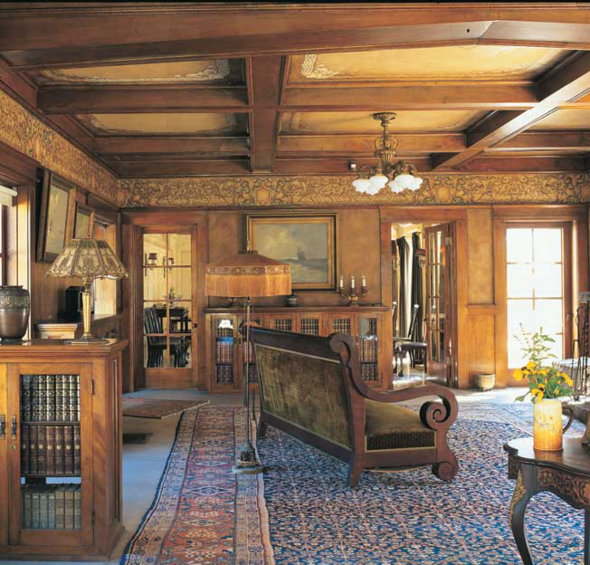 An original beamed-ceiling decoration scheme survives at the Lanterman House in California. below Narrow borders along beams coordinate with the pendant frieze in a revival room.