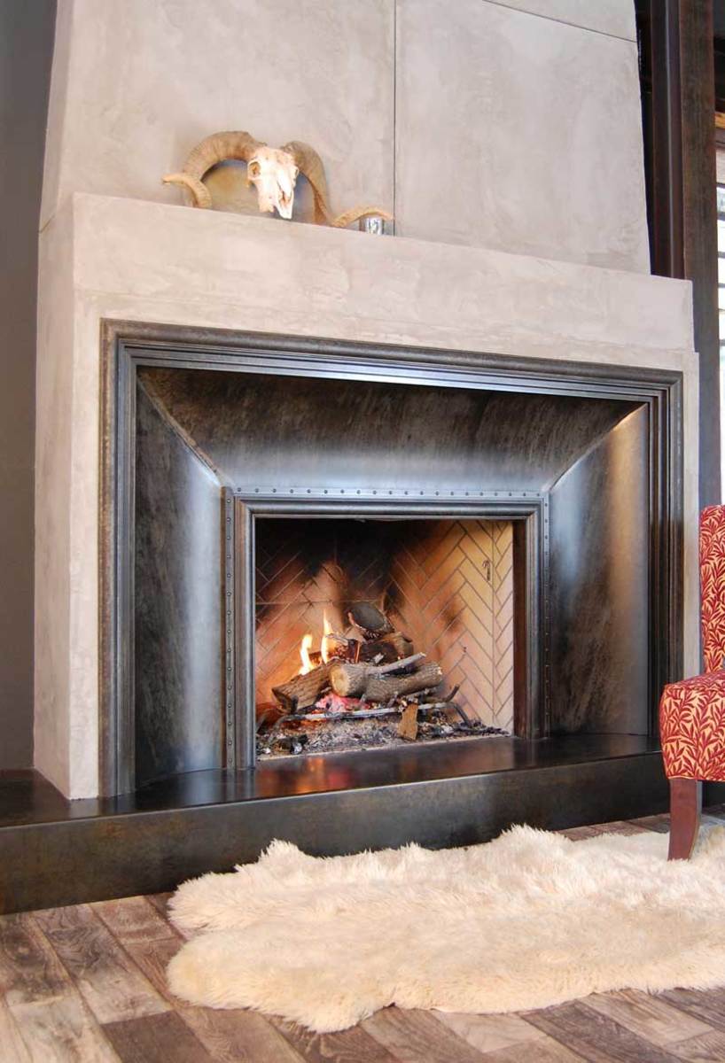 The couple installed a Cove fireplace surround in their own home—a refurbished former church.