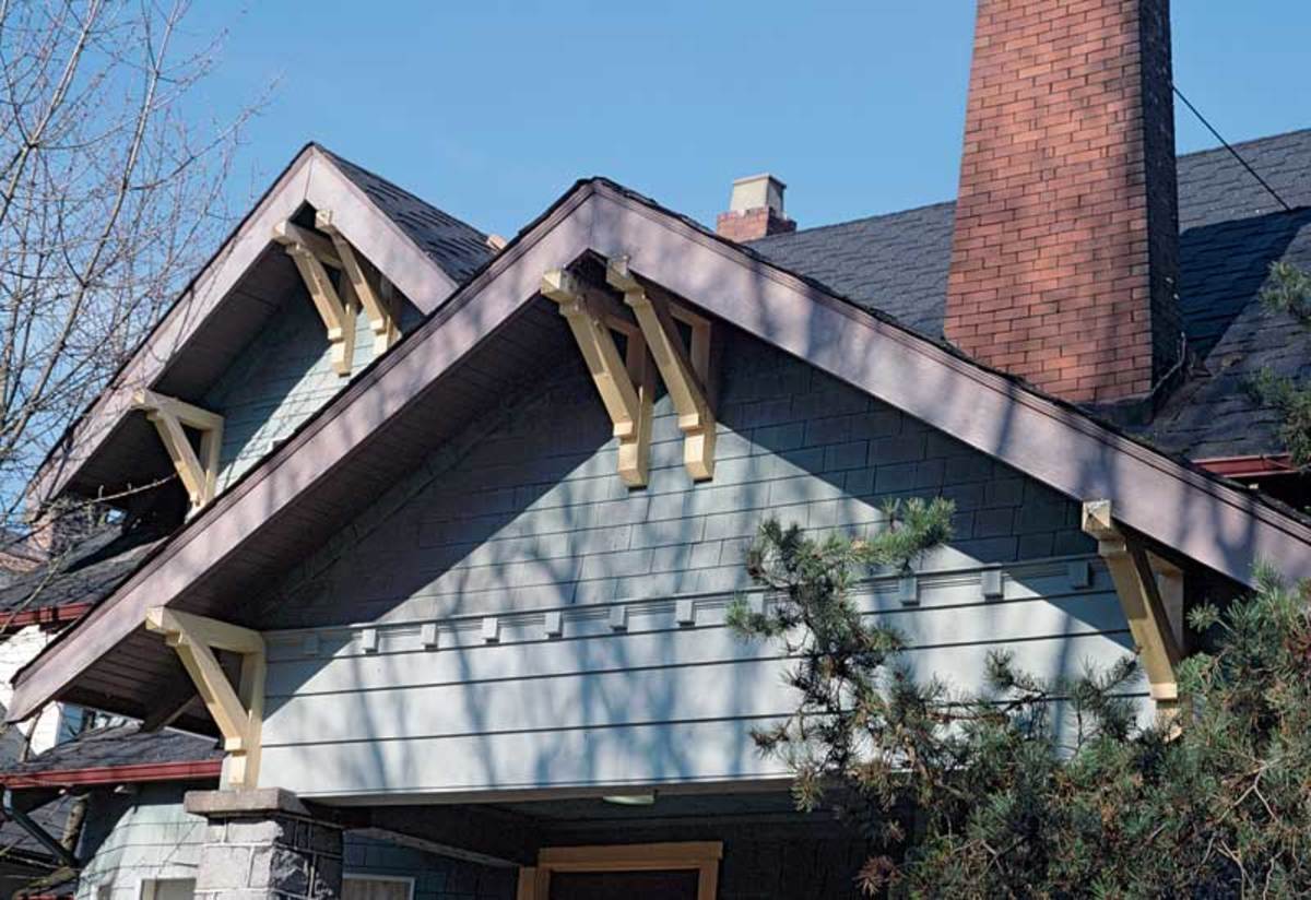 Knee braces are doubled in the gable peak, bungalow–chalet gable trim