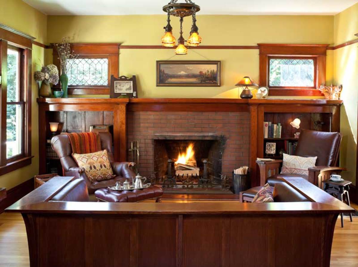 The living room is typical of the period, with its built-ins around the brick hearth, and leaded windows.