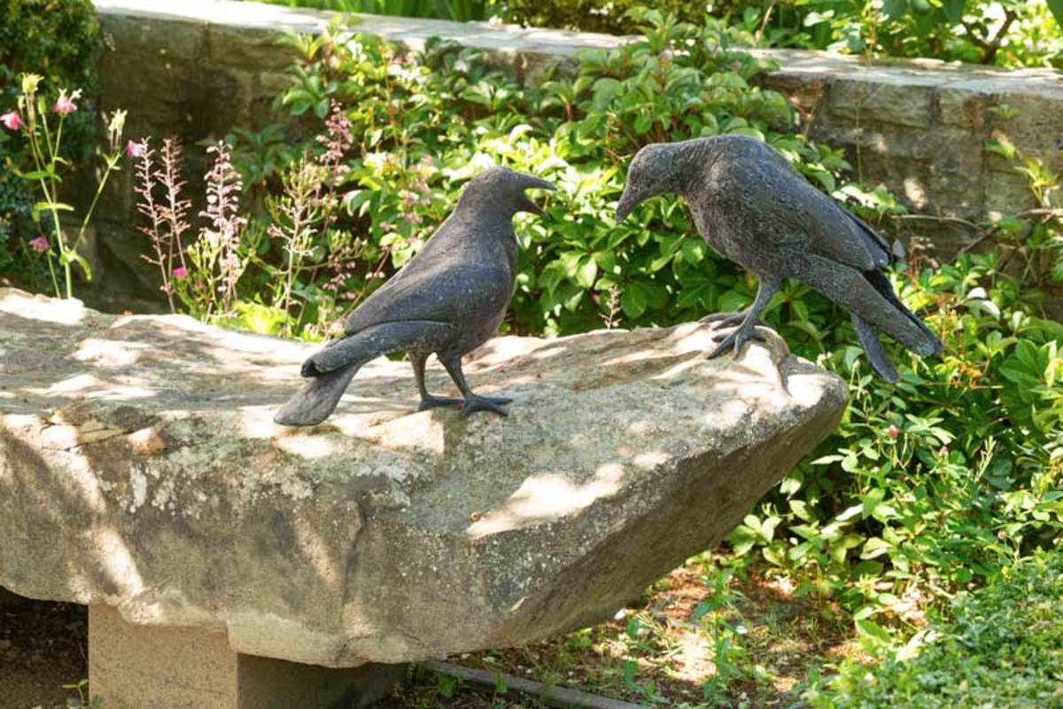 bronze birds, English country garden