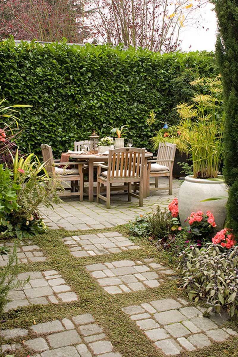 A flagstone patio with garden edging