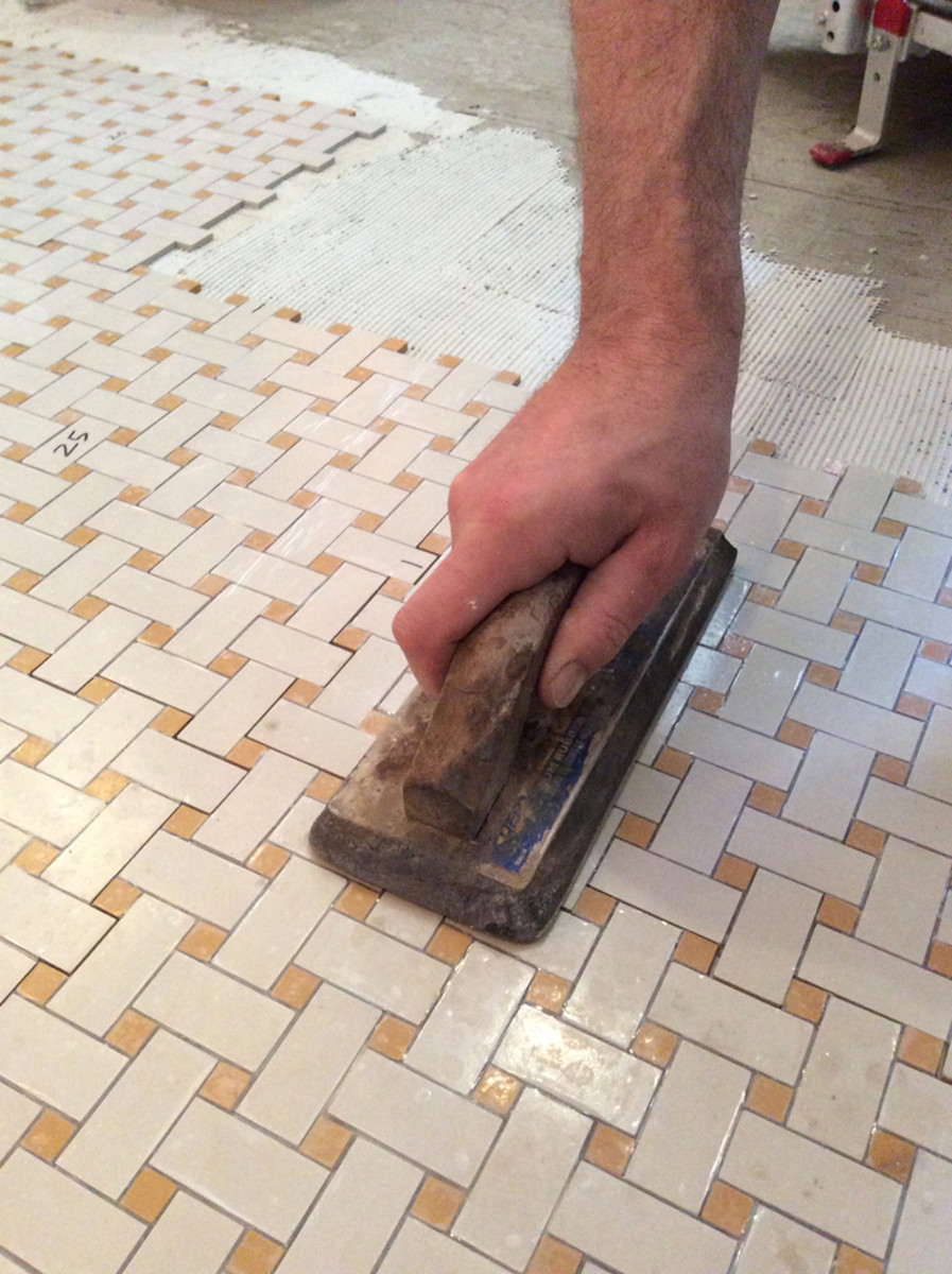Press tiles evenly into mortar.