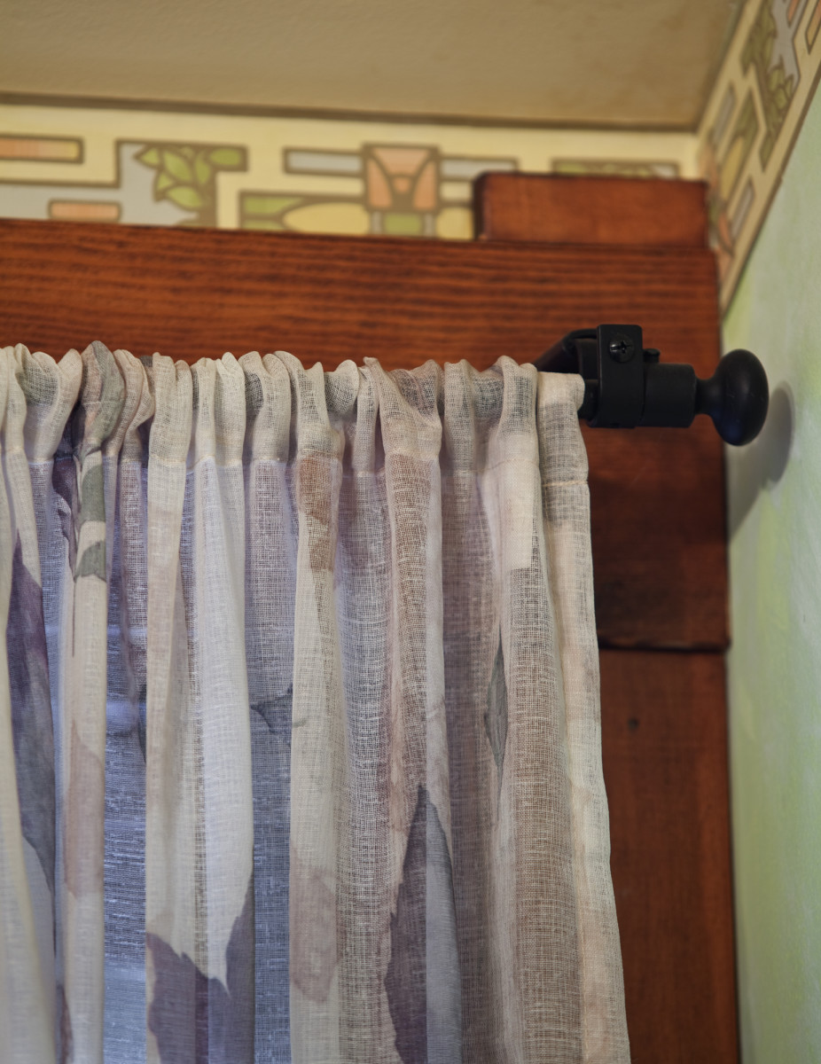 shirred curtain on an iron rod