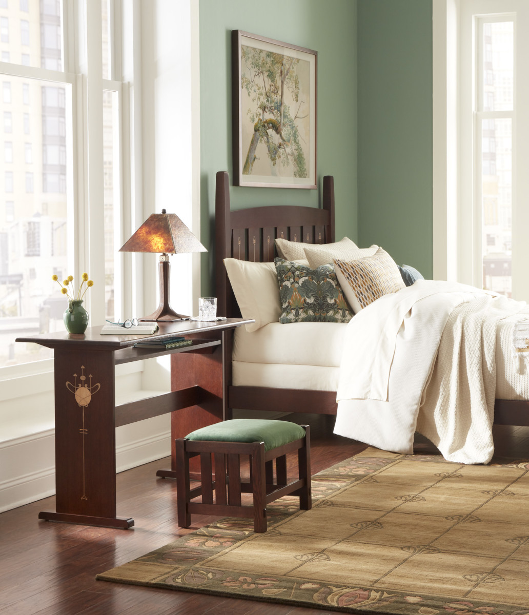 From Stickley's Mission collection, a bed and console with Harvey Ellis-designed inlays.