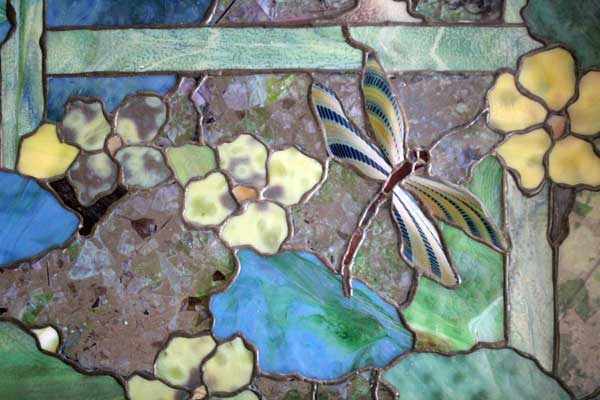 mixed-glass-with-a-confetti-background-includes-green-and-yellow-mixed-opalescent-glass-with-a-hazed-surface.jpg