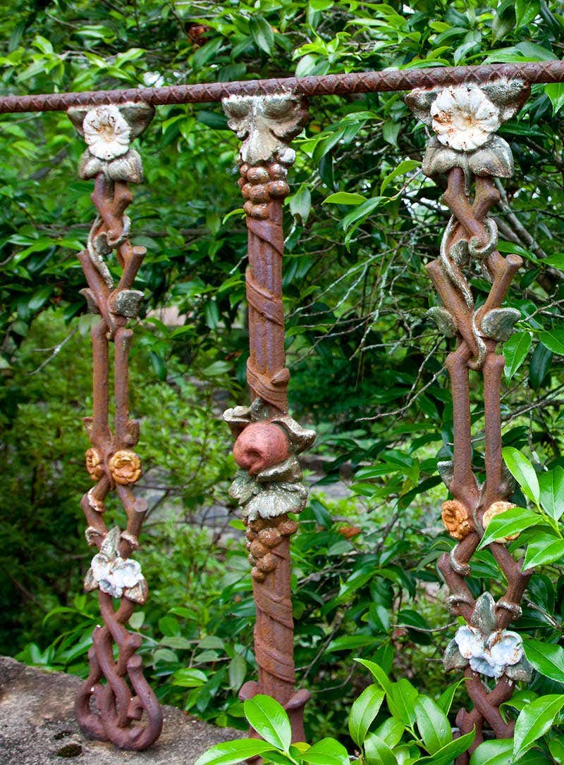 the-painted-iron-fence-is-from-new-orleans-mrs-fitzpatrick-held-tea-parties-for-montgomery-residents-who-were-invited-to-paint-the-fence-adding-more-color-to-the-gardens.jpg