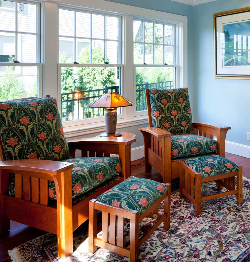 the-family-room-is-comfortably-furnished-with-reissued-pieces-by-stickley.jpg