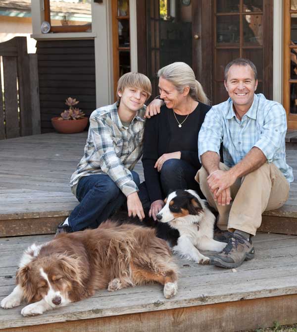 homeowner-john-bock-and-his-wife-diane-with-son-bryan-and-australian-shepherds-jenny-and-sue.jpg