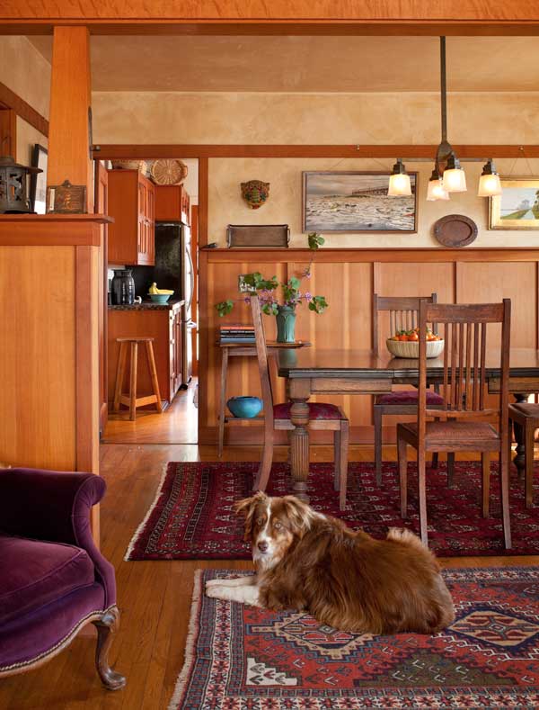 jenny-waits-for-dinnertime-four-antique-stickley-chairs-surround-a-table-of-unknown-originall-picked-up-at-a-yard-sale-in-texas-25-years-ago-the-antique-chandelier-has-shades-from-rejuvenation-note-th.jpg