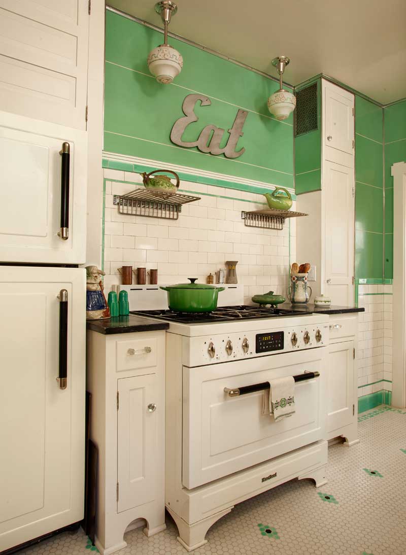 previous-owners-installed-the-reproduction-heartland-stove-and-flanking-cabinets-the-original-broom-closet-is-on-the-right.jpg