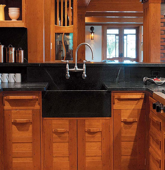 slate-soapstone-and-honed-granite-are-timeless-materials-for-countertop-and-backsplash-for-houses-of-almost-any-period-photo-by-carolyn-bates.jpg