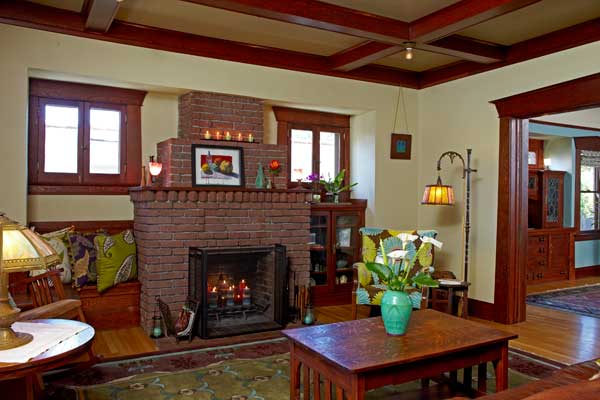 built-ins-flank-the-brick-fireplace-in-the-living-room.jpg