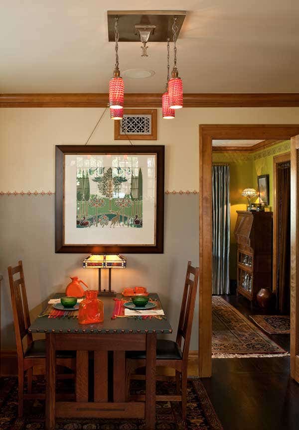 the-stag-a-period-design-by-cfa-voysey-produced-by-jr-burrows-is-framed-in-the-breakfast-room-this-table-is-an-antique-stickley-bros-piece.jpg