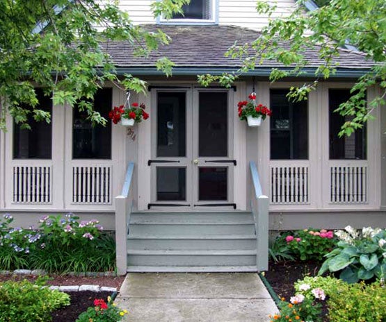 an-old-fashioned-screened-front-porch-built-using-vixen-hills-system-becomes-a-sunroom-when-the-screens-are-replaced-with-glass.jpg
