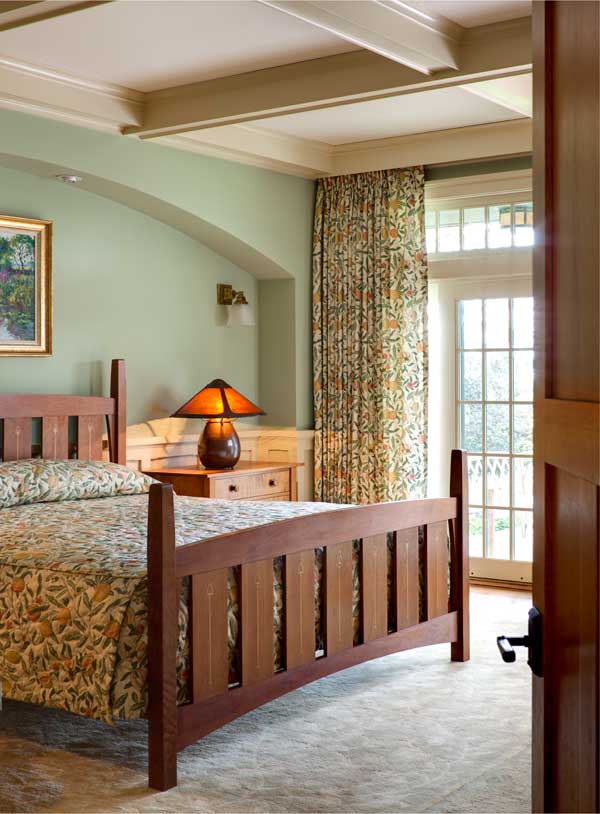 7-br-12in-the-master-bedroom-the-morris-designed-fruit-pattern-was-used-for-the-tailored-spread-and-drapery-the-inlaid-bed-is-a-harvey-ellis-design-reissued-in-cherry-by-stickley.jpg