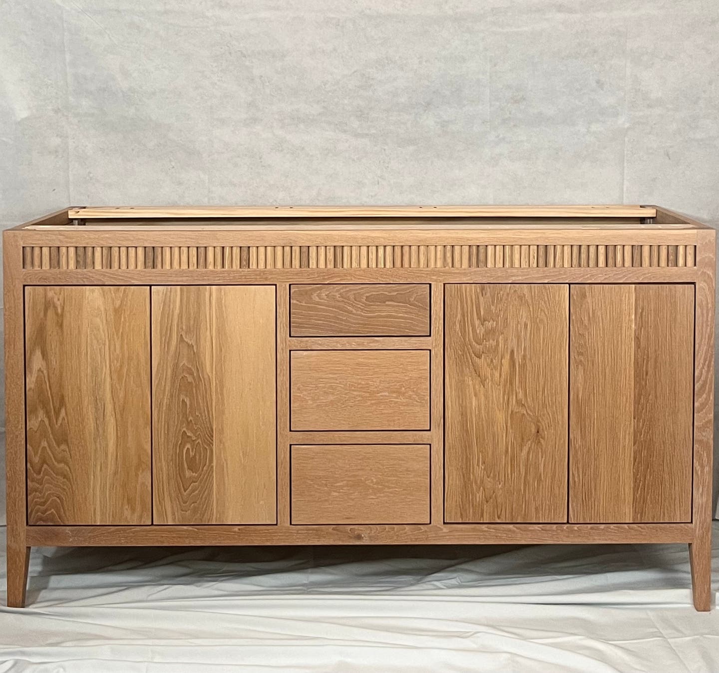 60-inch-white-oak-double-bathroom-vanity-with-fluted-details-smith-custom-woodworks.jpg